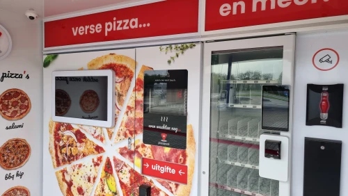 De automaat in de pizzapunt, welke pizza's snacks en drinken kan leveren De automaat in de pizzapunt, welke pizza's snacks en drinken kan leveren
