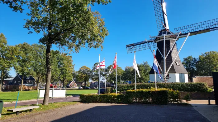 The windmill of Rolde on Grote Brink on a sunny autumn day.